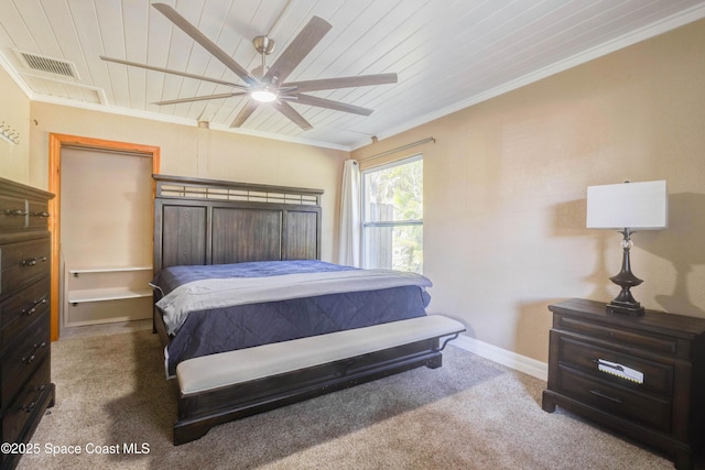 bedroom featuring carpet, crown molding, visible vents, wood ceiling, and baseboards