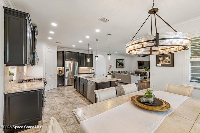 dining area with visible vents, recessed lighting, marble finish floor, and crown molding