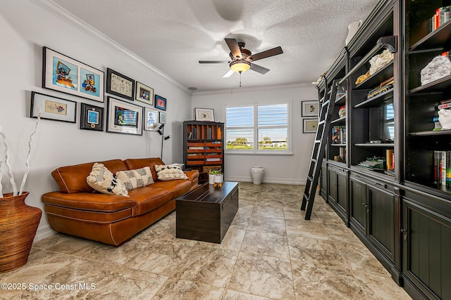 living area with baseboards, a textured ceiling, ornamental molding, and a ceiling fan