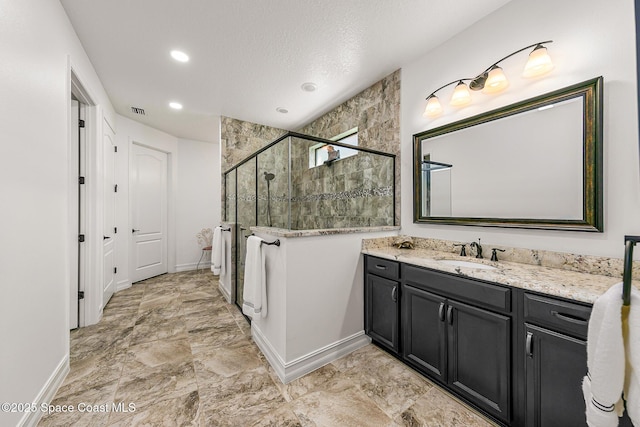 bathroom featuring visible vents, a shower stall, baseboards, recessed lighting, and vanity