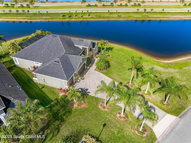 drone / aerial view featuring a water view