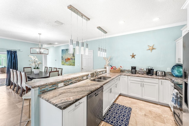 303 Harrison Ave, Cape Canaveral, FL 32920 - kitchen featuring a kitchen bar, a sink, white cabinetry, a peninsula, and dishwasher
