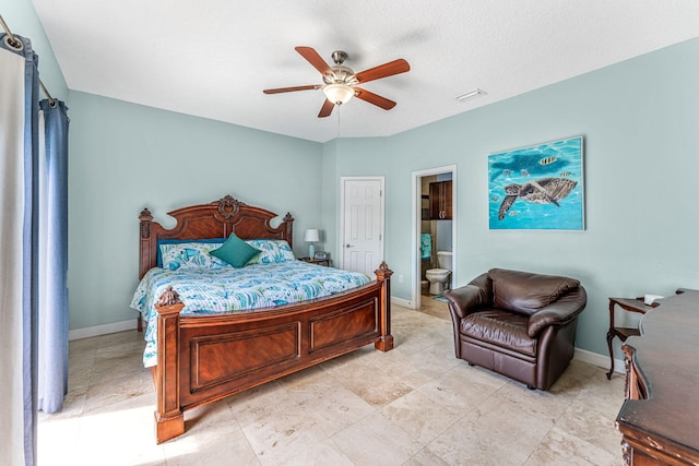303 Harrison Ave, Cape Canaveral, FL 32920 - bedroom with ceiling fan, baseboards, visible vents, and connected bathroom