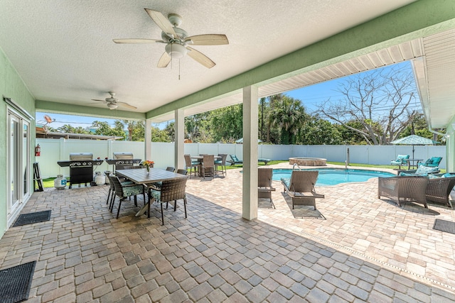 303 Harrison Ave, Cape Canaveral, FL 32920 - view of patio / terrace featuring outdoor dining space, a fenced in pool, a fenced backyard, ceiling fan, and a grill