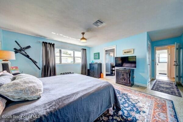 bedroom featuring visible vents, ceiling fan, and baseboards