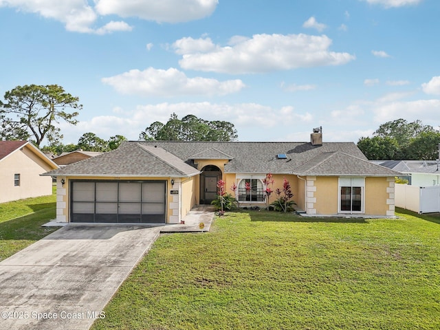 ranch-style home with a garage, concrete driveway, roof with shingles, and a front yard