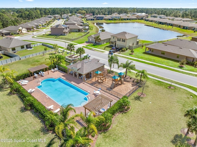 bird's eye view featuring a water view and a residential view