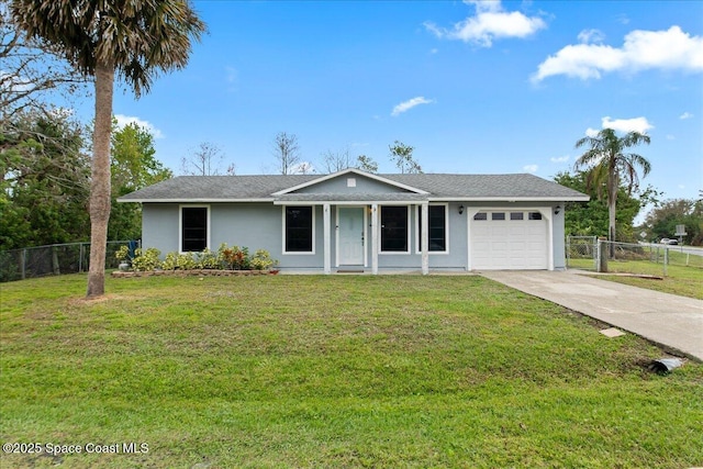 ranch-style home with an attached garage, fence, concrete driveway, and a front yard