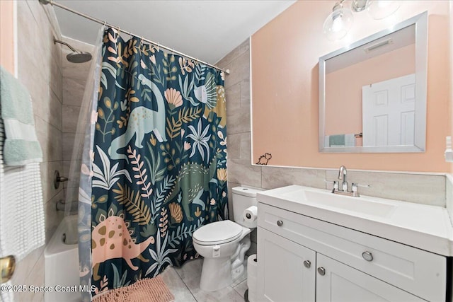 bathroom with tile walls, visible vents, toilet, shower / tub combo, and tile patterned floors