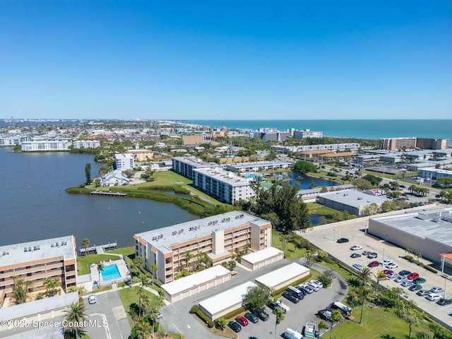 aerial view featuring a water view and a view of city