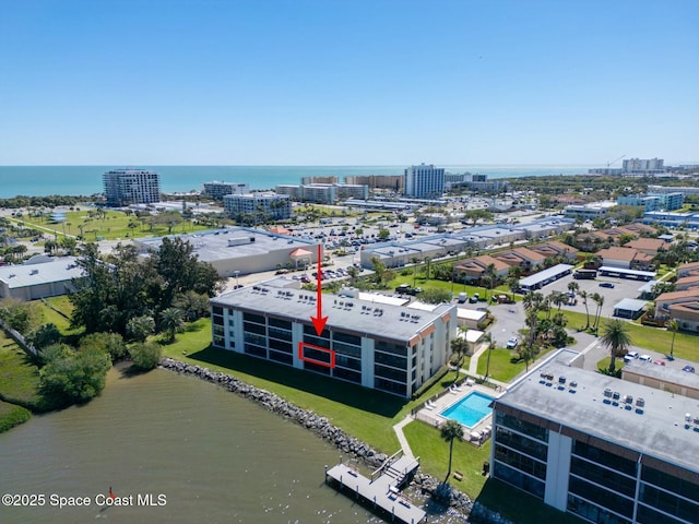 aerial view with a water view and a view of city