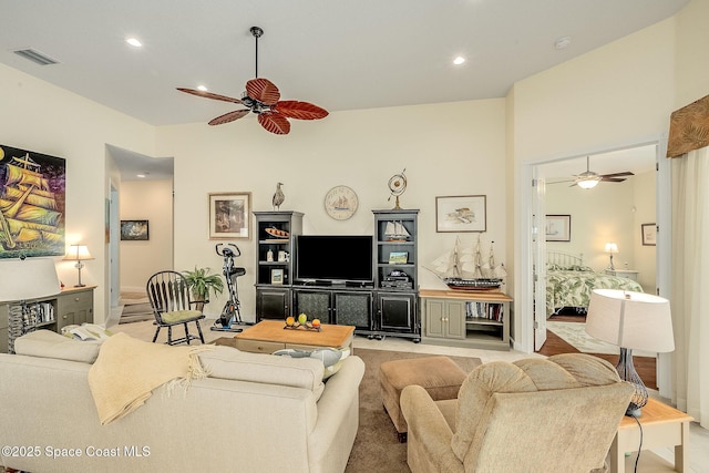 living area with visible vents, recessed lighting, and a ceiling fan