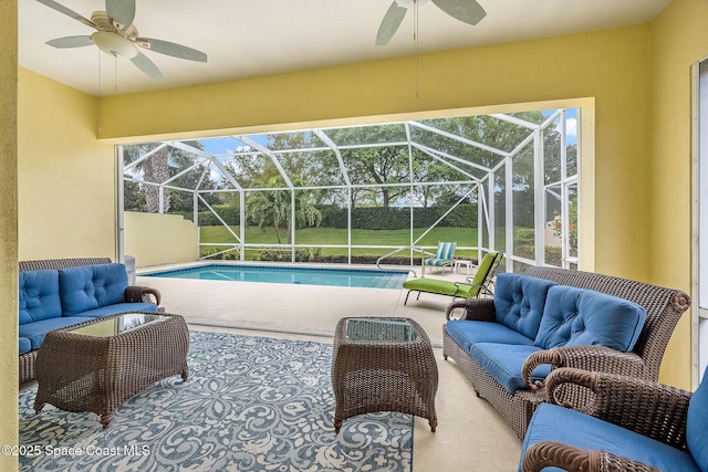 view of swimming pool with a ceiling fan