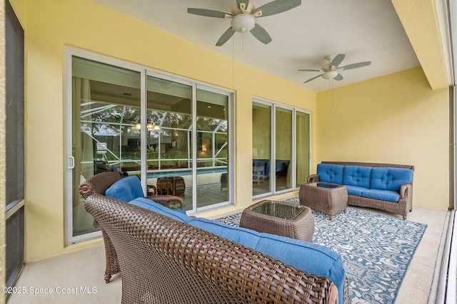 exterior space featuring an outdoor hangout area and ceiling fan