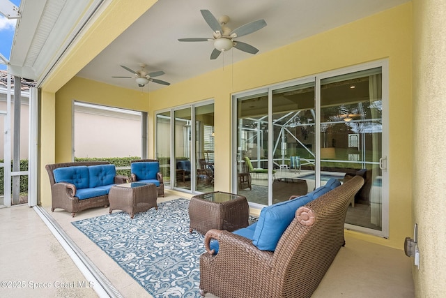 view of patio / terrace featuring an outdoor living space and ceiling fan