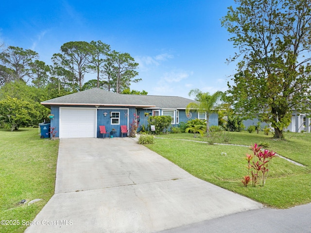 ranch-style house featuring concrete driveway, an attached garage, and a front yard