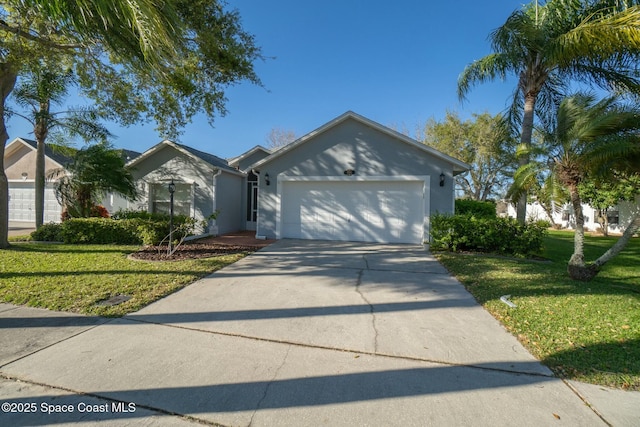 ranch-style home with an attached garage, driveway, and a front lawn