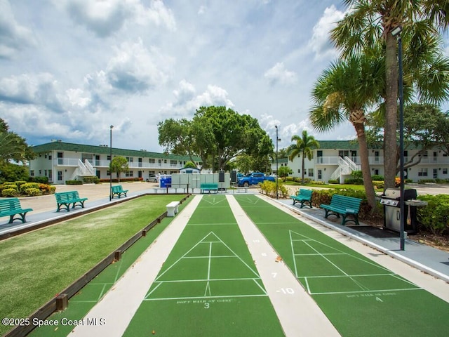 view of property's community with shuffleboard