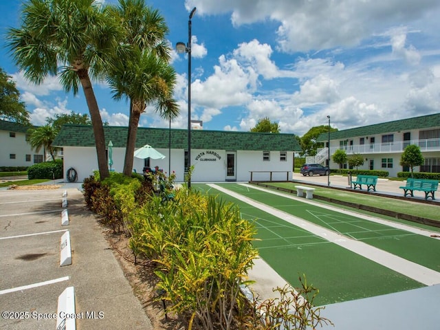 view of home's community with shuffleboard