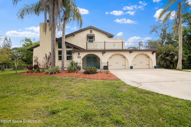 view of front of home with an attached garage, a balcony, concrete driveway, stucco siding, and a front lawn