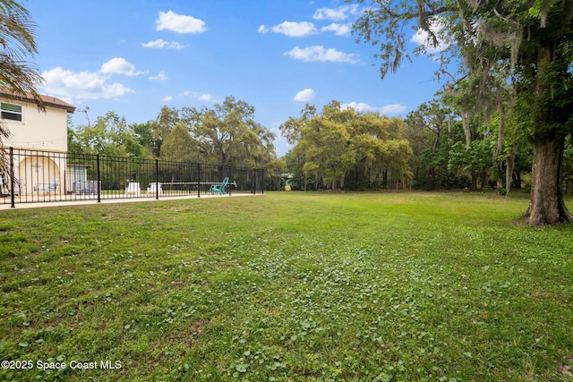 view of yard with fence