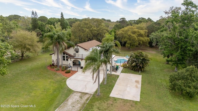 aerial view featuring a view of trees