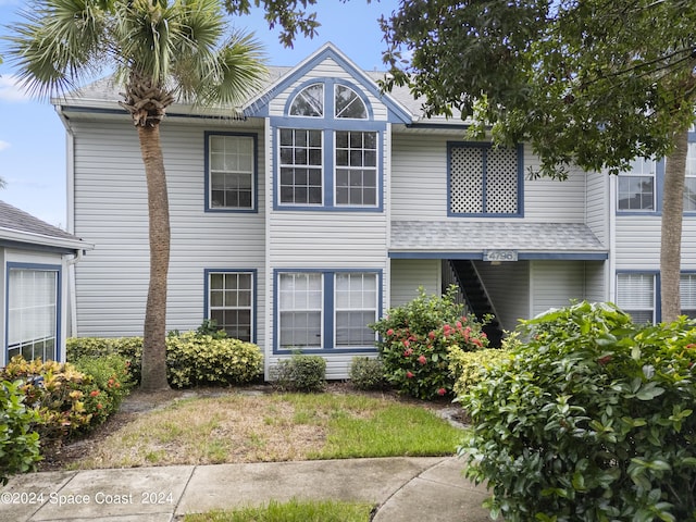 view of front of property with roof with shingles