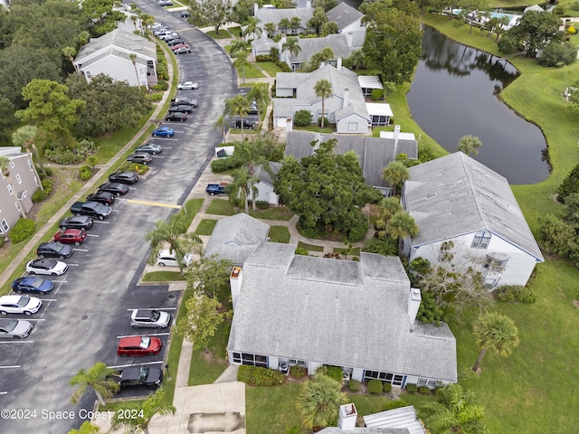 aerial view with a water view and a residential view