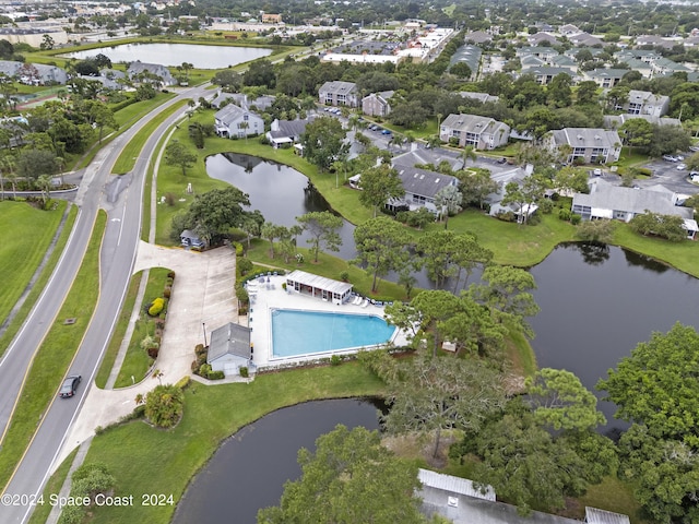 aerial view with a water view and a residential view