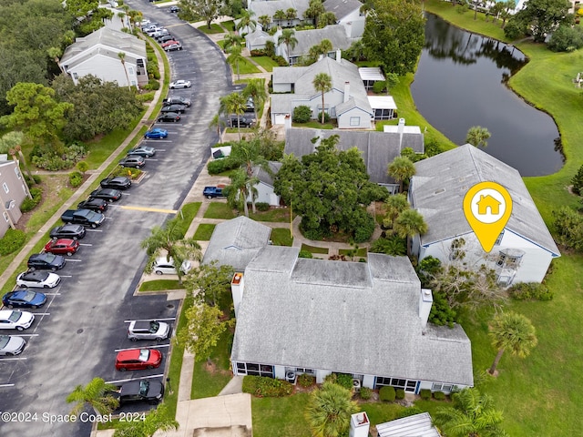 aerial view with a residential view and a water view