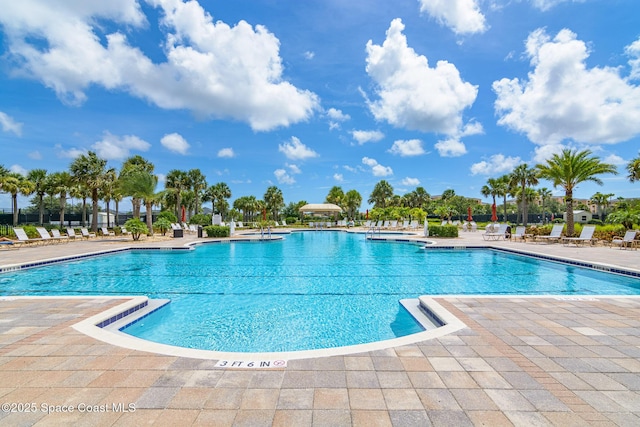 pool with a patio