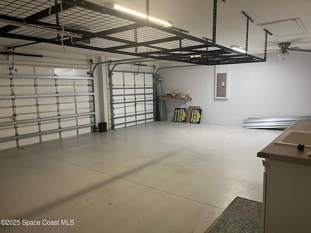 3485 Sansome Cir, Melbourne, FL 32940 - garage featuring electric panel and concrete block wall