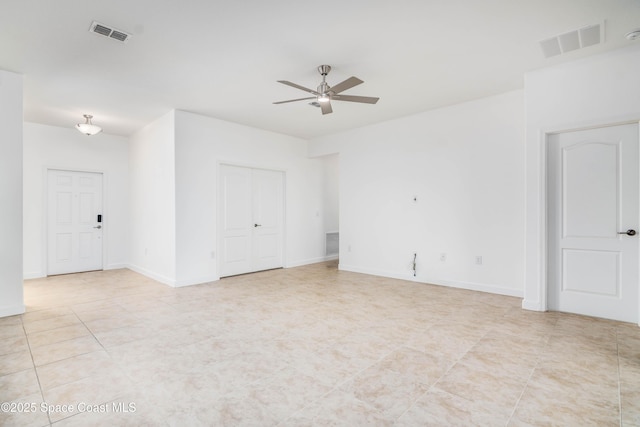 3485 Sansome Cir, Melbourne, FL 32940 - unfurnished room with a ceiling fan, light tile patterned floors, and baseboards