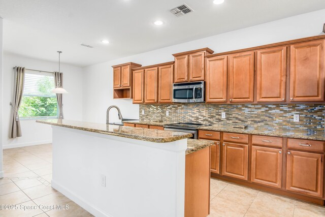 3485 Sansome Cir, Melbourne, FL 32940 - kitchen featuring appliances with stainless steel finishes, tasteful backsplash, light stone counters, light tile patterned floors, and recessed lighting