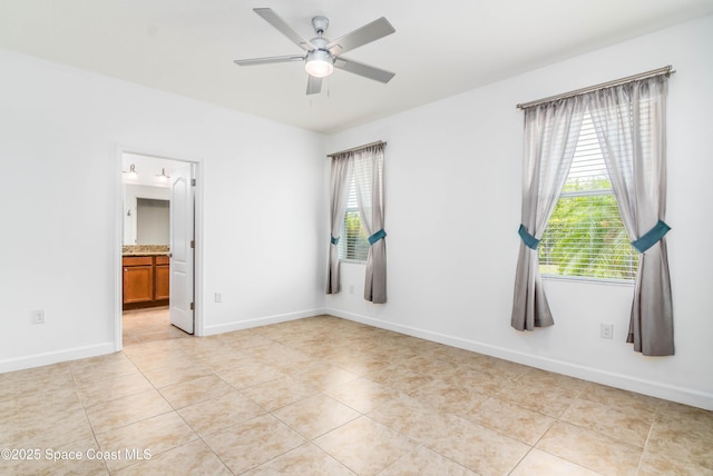 3485 Sansome Cir, Melbourne, FL 32940 - spare room with ceiling fan, plenty of natural light, and light tile patterned floors