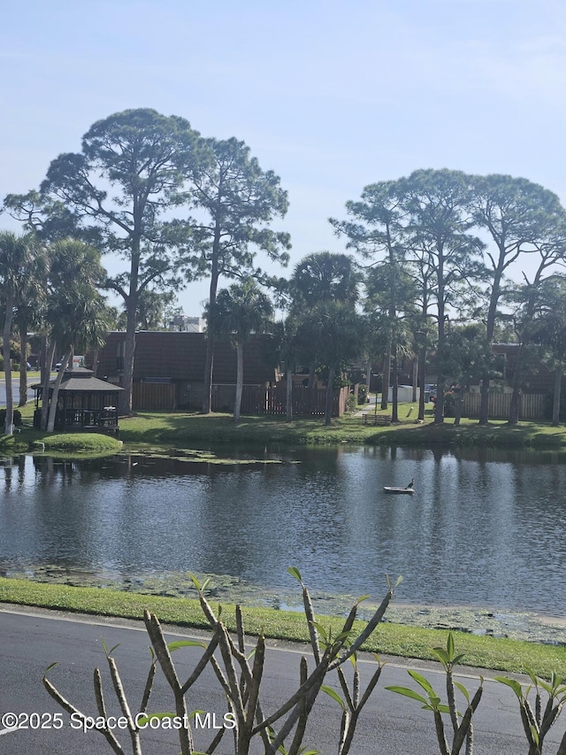 view of water feature with fence