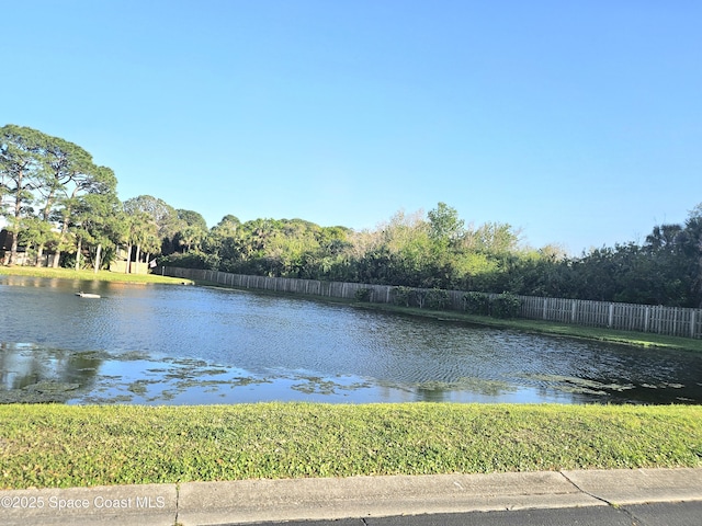 water view featuring fence