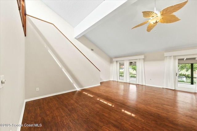 unfurnished living room with lofted ceiling, ceiling fan, baseboards, and wood finished floors