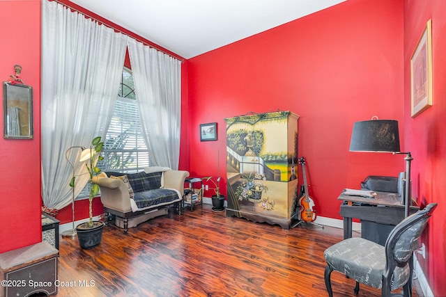 sitting room featuring wood finished floors and baseboards