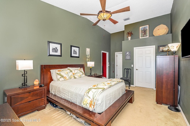 bedroom with baseboards, visible vents, ceiling fan, and carpet flooring