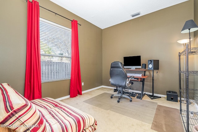 bedroom with carpet, visible vents, and baseboards