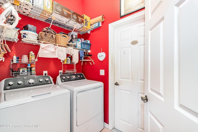 washroom featuring laundry area and independent washer and dryer