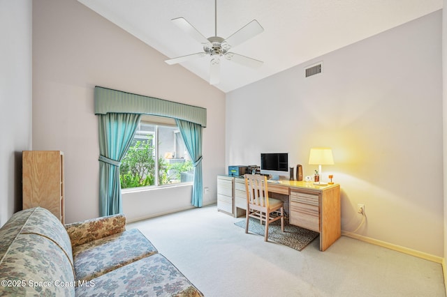 carpeted office space with visible vents, vaulted ceiling, baseboards, and ceiling fan