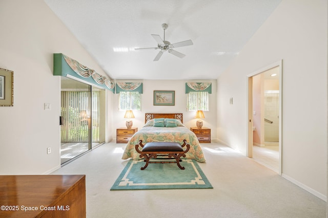 bedroom featuring carpet, access to outside, baseboards, and vaulted ceiling