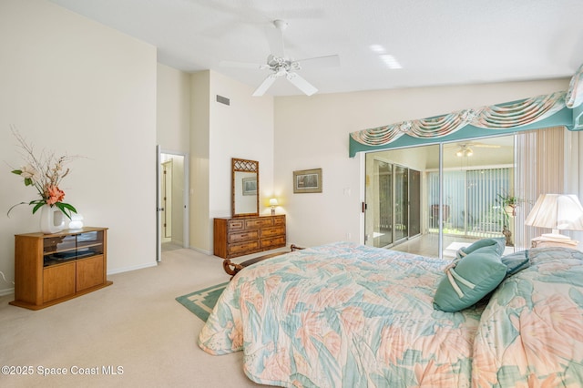 bedroom featuring access to exterior, visible vents, carpet flooring, ceiling fan, and baseboards