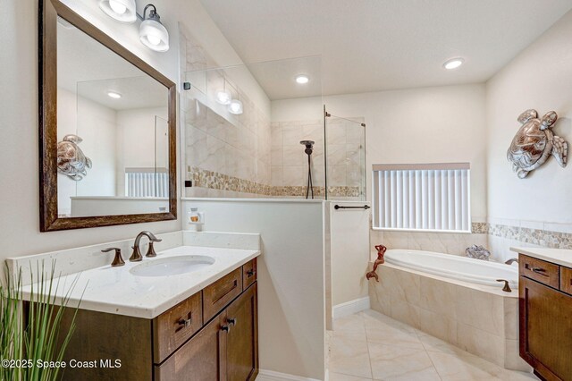 full bathroom featuring recessed lighting, a garden tub, vanity, and walk in shower