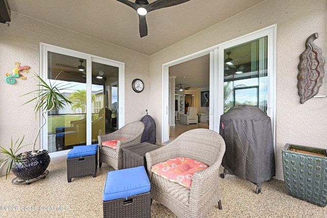 view of patio featuring ceiling fan