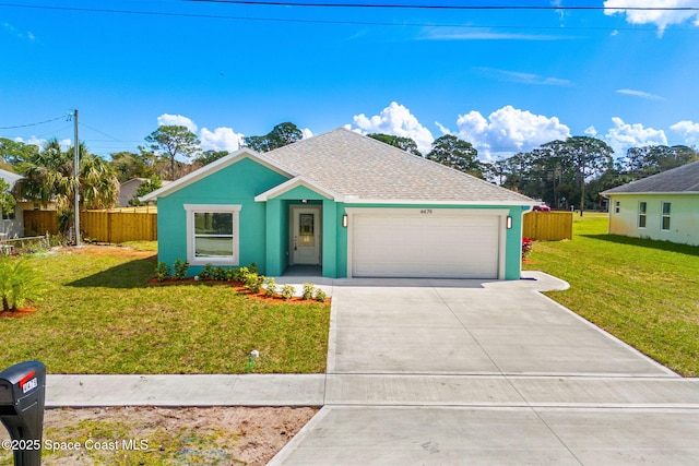 ranch-style home featuring concrete driveway, fence, an attached garage, and stucco siding