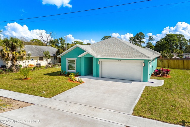 ranch-style home with concrete driveway, an attached garage, fence, a front lawn, and stucco siding