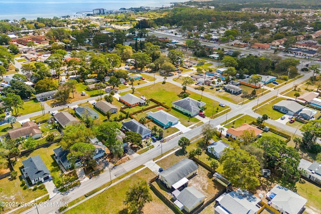 aerial view with a water view and a residential view